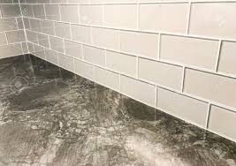 How to renovate the bathroom with magic' tile covering kit. Grey Countertop With White Tile Backsplash Plased Horizontaly Stock Photo Picture And Royalty Free Image Image 113376652