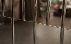 Gorgeous venetian mirror with colbalt mirrored insets and with smoked grey mirrored borders. Pleat Mirror Panel By Afroditi Krassa Archello