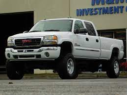 Auto trans, ps, pb, ac cold although needs blower motor,am/fm radio, tires are fair, comes with western 8.5' snow plow. 2005 Gmc Sierra 2500 4x4 Leather 6 6l Duramax Diesel Lifted Lifte