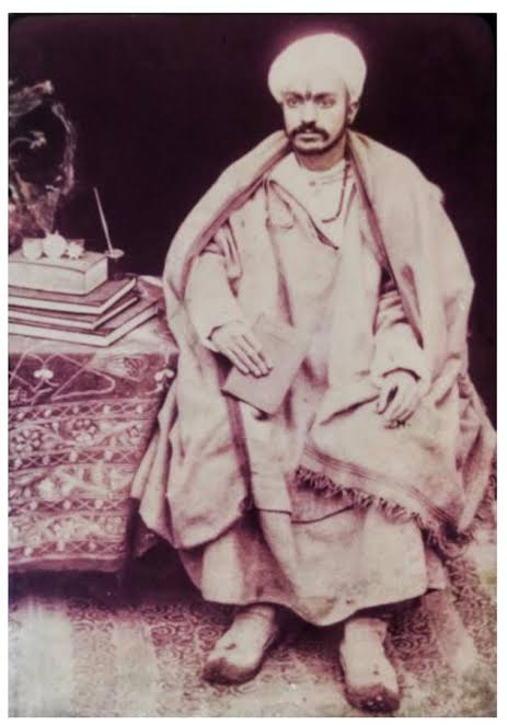 1870 pic of a Pandit reading the Shastras