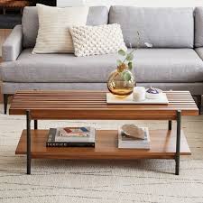 Clear, tempered glass shelf and top. West Elm Slatted Wood Coffee Table By West Elm Dwell