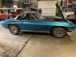 Use the red road that cuts the hill in half to access the barn. Rare C2 Corvette Fuelie Barn Find Buried Under 36 Years Of Rubbish