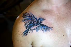 Blue Bird With White Ring Around Neck Abstract Blue Bird Tattoo A Photo On Flickriver Geometric Tattoo Bird Bird Shoulder Tattoos Bluebird Tattoo