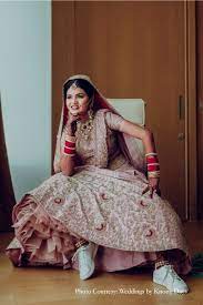 lisha and abhinandan the westin kolkata rajarhat weddings weddingsutra indian wedding fashion pink lehenga bride