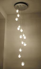 Loosen and remove the screws that secure the light fixture at the electrical box in the ceiling, and pull the fixture down to access the wires. Getop American Style Crystal Glass Ball Meteor Shower Chandelier Restaurant Bedroom Led Lighting Fixt Stairway Lighting Staircase Lighting Ideas Stair Lighting