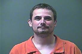 Another Charge for Alleged Escapee