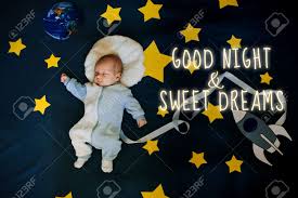 Greeting Card With The Inscription Good Night And Sweet Dreams Little Boy Baby Sleeping Astronaut Stock Photo Picture And Royalty Free Image Image 145006358