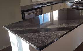 White ice granite is a beautiful granite countertop color choice to pair with white kitchen cabinets and white subway tiles. Cool Steel Grey Granite Beautifully Compliments Your White Cabinetry Cabinets And Countertops How To Install Countertops White Cabinetry