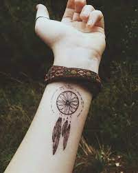 Dream catcher leg tattoo designs @seftatto on instagram. 24 Dreamcatcher Tattoos On Wrist For Girls