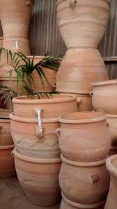 Broken terracotta flower pot with soil on wooden background, flat lay. 40 Greek Terracotta Pottery Ideas In 2021 Garden Design Terracotta Antique Terra Cotta Pots