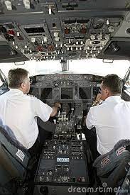 Airplane Pilots In Cockpit Preparing To Takeoff Cockpit Airplane Pilot Airplane