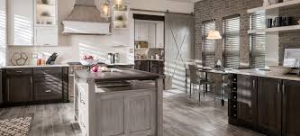 Whether it's oak, maple, cherry or walnut, natural wood has a color tone that can be enhanced by paint color or patterns on fabric. Medallion Cabinetry Using Gray In A Timeless Way