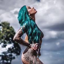 The largest pin up designs will work best as back tattoos. 100 Sexiest Tattooed Women Tattoo Ideas Artists And Models