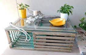 Beach house decor, styling a coffee table love the yellow coffee table in an otherwise neutral blue and white living room. 15 Coffee Tables That Are The Perfect Match For A Beach House Beach Bliss Living