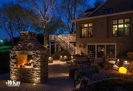 Enclosed fire pit with chimney. Outdoor Living Fireplace Fire Pit Landscape Lighting