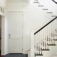 Black and white banister ideas. White Staircase Post With Black Railing Design Ideas