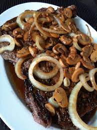 Rib eye steaks are known to contain more marbling, which means more flavor. Rib Eye Steak With Mushroom And Onion Beef Recipes Cooking Recipes Yummy Food