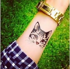 Maybe you would like to learn more about one of these? Cool Cat Tattoo On The Arm Cat Tattoo Cat Tattoo Designs Tattoos