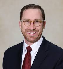 Alan Mila moves from Christ the King pews to principal's office