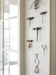 If you love hanging photos but don't love the idea of spending a fortune on frames, there are many cute and easy ways you can hang your photos, or any pieces of art a unique alternative for larger photos is to use skirt or pants hangers that you have lying around. 5 Ways To Keep Your Collection From Looking Like Clutter Hgtv S Decorating Design Blog Hgtv