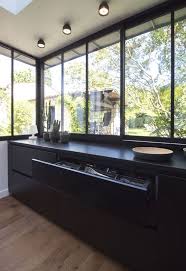 La Cuisine Noire En 26 Ambiances Chics Et Tendances Cuisine Noire Veranda Cuisine Cuisine Moderne