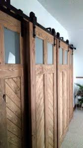 How to build a modern barn door for $50. Installing Sliding Barn Door Hardware With Bypass Brackets