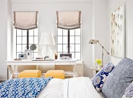 The bed is actually right above the desk area, maximizing space potential. Master Bedroom With Desk Transitional Bedroom