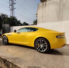 Image result for Sunburst Yellow 2017 Aston Martin