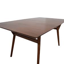 The table is fairly simply constructed with 4 triangular shaped screwed into cut out corners of the table top. 43 Off West Elm West Elm Mid Century Walnut Expandable Dining Table Tables