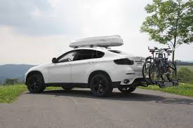 Bmw X6 Mit Anhangerkupplung Fahrradtrager Und Dachbox Bmw X6 With Towbar Bike Carrier And Roof Box Car Travel Bmw Bike