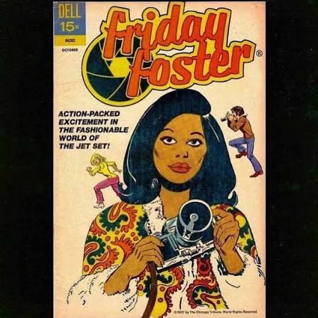 Press photo of Pam Grier as a photographer in the 1975 blaxploitation film, Friday  Foster. Foster was a former fashion model who became an assistant to a  world-famous photographer at a glamour