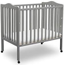 Amazon Com Delta Children Folding Portable Mini Baby Crib With Mattress Grey Baby Baby Cribs Delta Children