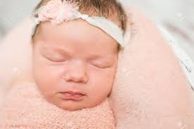 Newborn hair loss is perfectly normal and nothing to worry about. Cute Face Of Sleepy Newborn Baby With Hair Band Lying On Soft Stock Photo Picture And Royalty Free Image Image 66160197