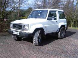 Image result for Shooting White 1964 Daihatsu