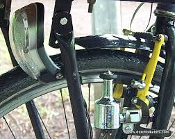 A bicycle dynamo works by converting the mechanical motion of the rotating wheel into electrical motion with the use of a magnet. Www Dutchbikebits Com Selecting And Installing Dynamo Lighting