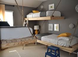 The hanging bed offers a sacred escape from terra firma; 10 Cool Beds To Hang From Your Ceiling Sheknows