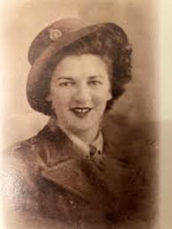 This should jog a few memories Axmouth Flower Show week August 1948. These  are the Axmouth United AFC committee and ladies The girl