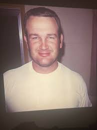 Gene Fisher from Sherrills Ford catcher for Howard's Furniture Softball  Team about 1971