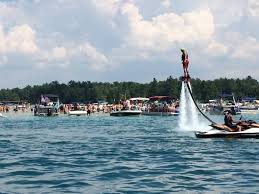 Whispering pines, privately nestled in the arms of torch river, is your home away from home. Torch Lake Michigan Trip Planner Best Places To Stay Boat Rentals The Sand Bar Local Things To Do Grkids Com