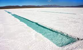 Polluted water, blue with chlorine, at a lithium mine in the atacama desert, chile. Coronavirus Halts Lithium Expansion In Chile And Argentina