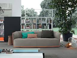 Modern interior design of living room, night scene with contrasting colors, millennial pink couch with green blue sofa. 15 Modern Couches With Diverse And Versatile Designs