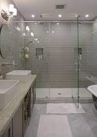 A pane of privacy glass lets natural light enter the room, illuminating the shower stall. Elegant And Modern Bathroom Shower Tile Master Bath Ideas 28 Contemporary Master Bathroom Bathroom Remodel Shower Small Bathroom Remodel