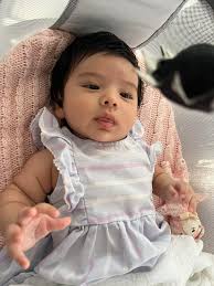 Reintroducing baby to bath after showering?