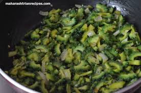 Make tempering as usual by adding cumin seeds and mustard seeds. Karlyachi Bhaji Karela Recipe Maharashtrian Recipes