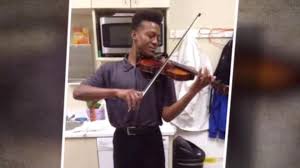 On august 24, 2019, an aurora citizen reported to police that mcclain was wearing a ski mask and looked sketchy, and that he believed mcclain was unarmed. Officers Investigated Over Photos At Elijah Mcclain Memorial Cbs News