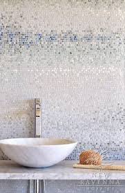 It's a mosaic of gray and white tiles that are vertically staggered. 7 Make Or Break It Considerations For A Bath Remodel Dlghtd Contemporary Bathroom Tiles Mosaic Backsplash Ravenna Mosaics