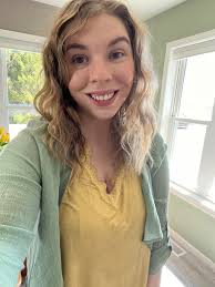 What is the outfit except for earrings and tank?