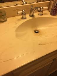 Stylized gold or platinum brick border painted on a white bates & bates undermount bathroom vanity basin. Need Advice If It Was Possible To Restore This Old Bathroom Sink
