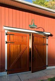 A Range Of Pre Made Workbenches Are Readily Available To Fit Your Needs If You Choose You Can Make Your Own Wor Barn Door Garage Garage Doors Diy Garage Door