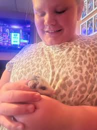 My buddy cleaning up the cat food